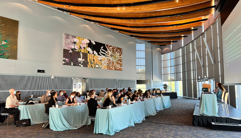 The Great Hall at UC San Diego, with the 2022 Public Policy and Nuclear Threats cohort listening to a panel. There are three rows of attendees.