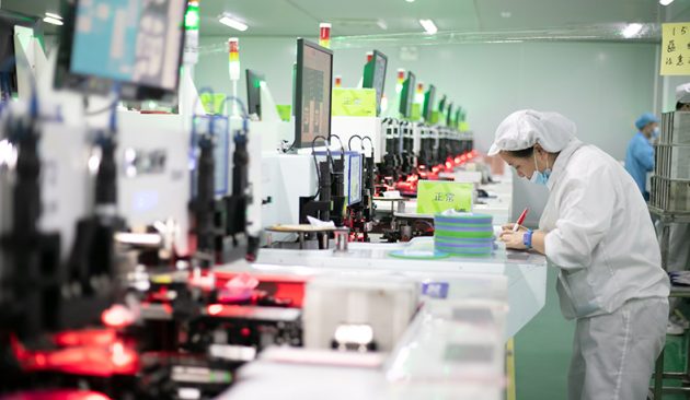 Highly educated blue-collar workers produce LED products at a high-tech enterprise in Jiujiang, China.