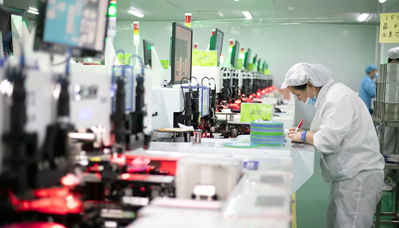 Highly educated blue-collar workers produce LED products at a high-tech enterprise in Jiujiang, China.
