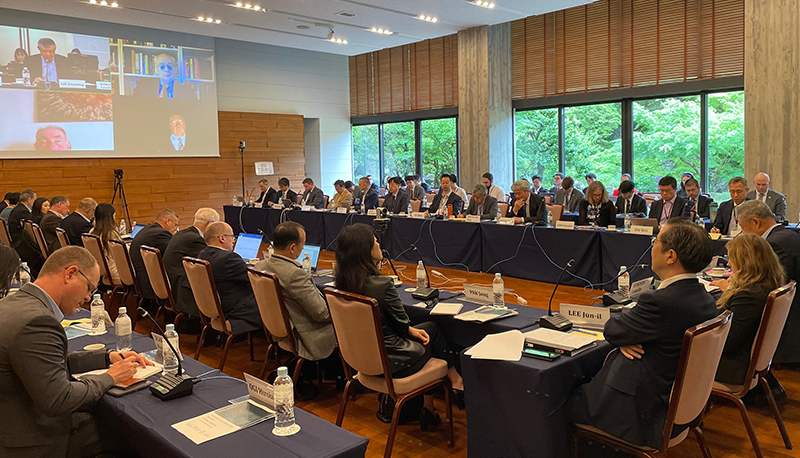 Attendees at the 2024 Northeast Asia Cooperation Dialogue gather in a conference room at the International House of Japan in Tokyo.
