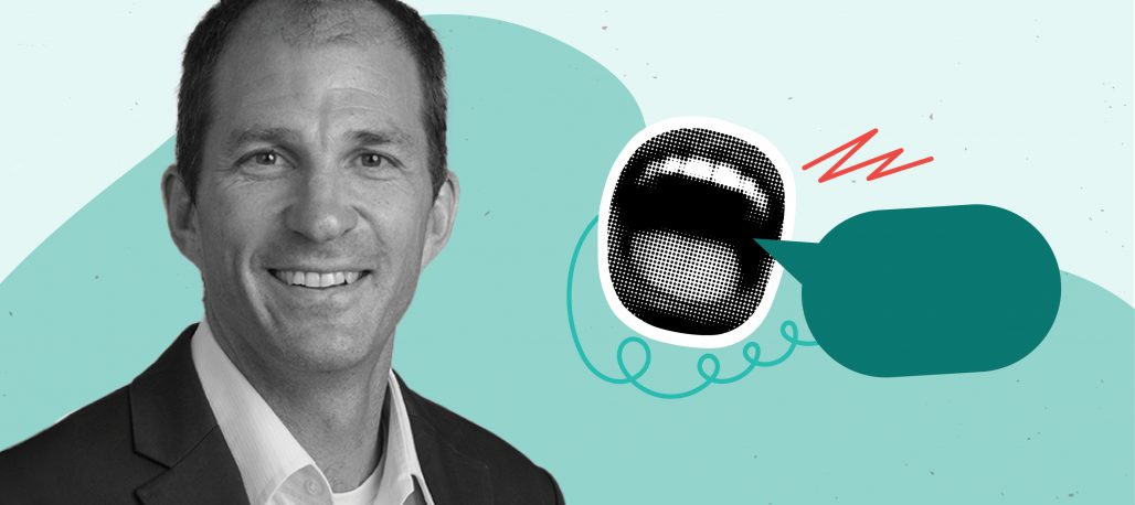 Black and white headshot photo of Zoltan Hajnal next to a clipart image of an open mouth and speech bubble, overlayed on a two-tone teal background