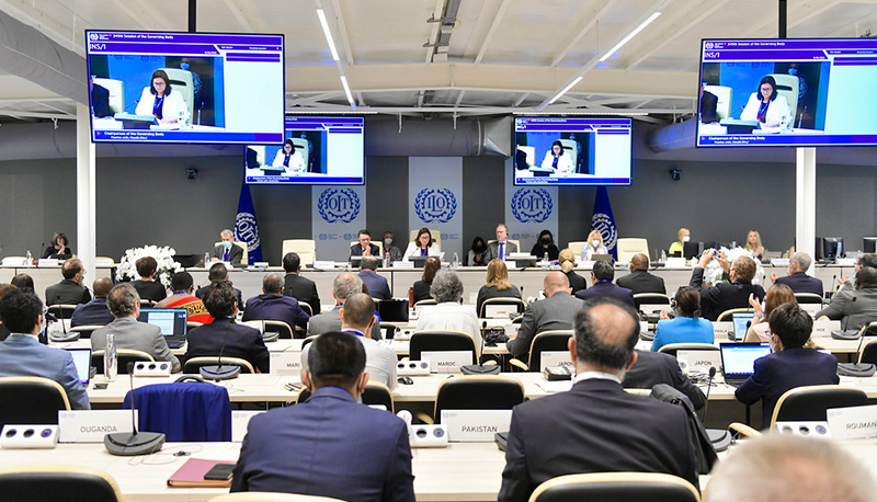 ILO delegates attend an address