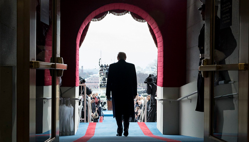 President-elect Donald Trump walks to take his seat for the inaugural swearing-in ceremony at the U.S. Capitol in Washington, D.C., Friday, January 20, 2017