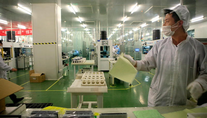 Solar cell manufacturing lines at the Suntech Solar Energy factory in Wuxi, China