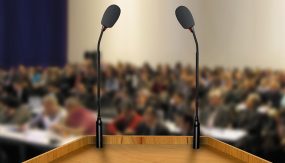 A debate podium with two microphones