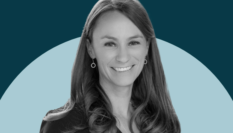 black and white headshot of Sheena Greitens overlaid on a two-tone blue background