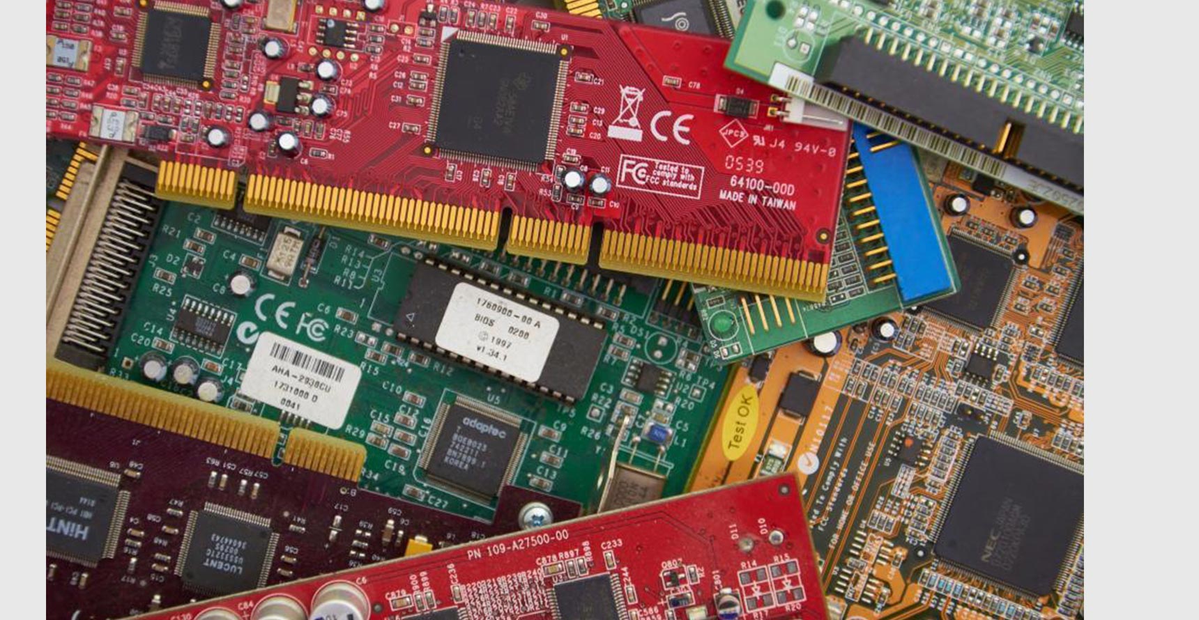 several colorful computer circuit boards stacked on top of each other