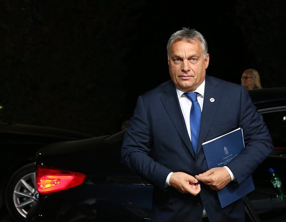Viktor Orbán, Prime Minister of Hungary, exits a vehicle.