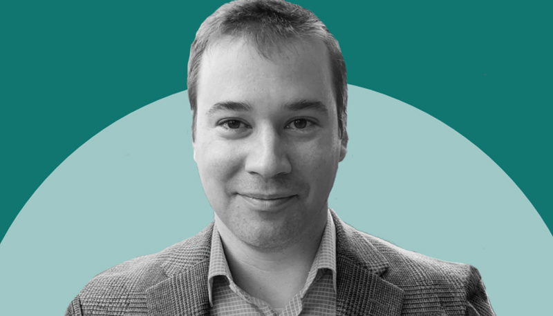 Mike Albertson black and white headshot photo overlaid on a two-tone green background