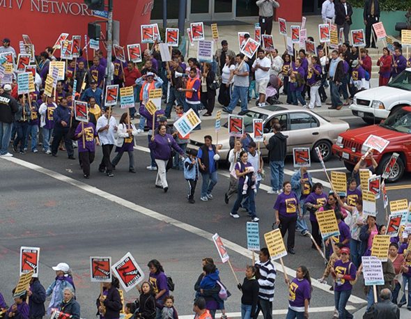 Overhead photo of janitorial workers threatening to strike in Santa Monica, CA