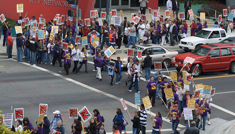 Overhead photo of janitorial workers threatening to strike in Santa Monica, CA
