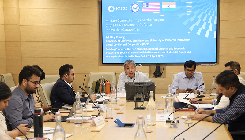 Participants at IGCC's Strategic Training on China, Technology, and Security in India sit at a conference table with IGCC Director Tai Ming Cheung