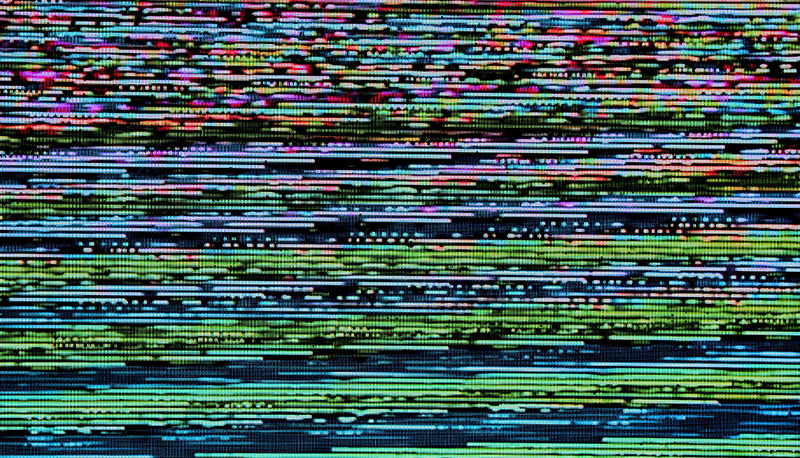 Photo of static on a digital screen.