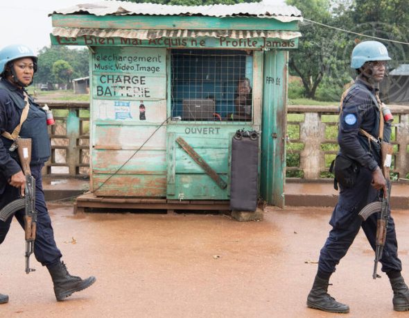 Military and police peacekeepers serving with the UN Multidimensional Integrated Stabilization Mission in the Central African Republic (MINUSCA) patrol the Muslim enclave of PK5 in Bangui.
