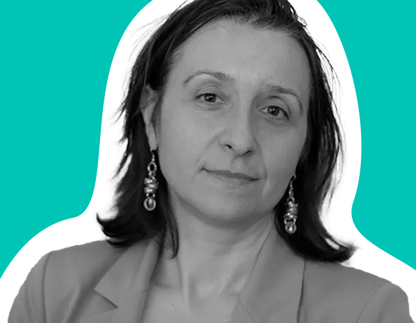 Black and white headshot of Francesca Giovannini on a teal background