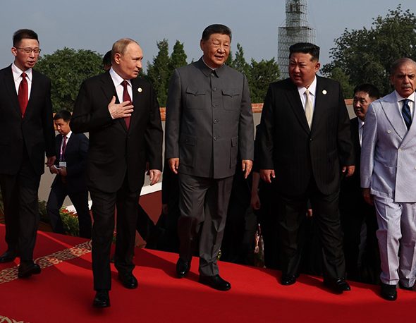 Photo if Xi Jinping, Vladimir Putin, and Kim Jong Un attending the 2025 China Victory Day Parade in Beijing, 2025.