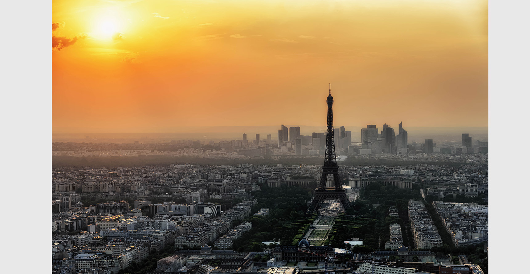 The sun rises over the Paris skyline, view from the observation deck of the Montparnasse tower