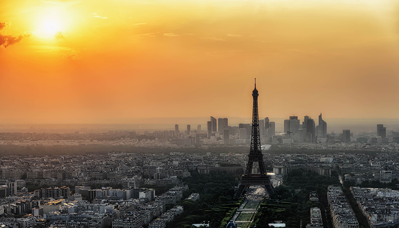The sun rises over the Paris skyline, view from the observation deck of the Montparnasse tower