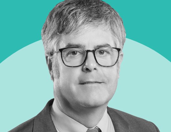 A black and white headshot photo of Thom Mason overlaid on a two-tone teal background