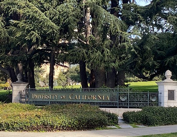 Photograph of the "University of California" sign at an entrance to the UC Berkeley campus
